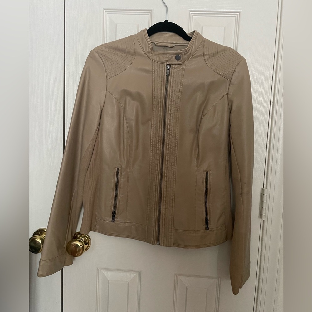 Bass 
Women’s beige motor style leather jacket.